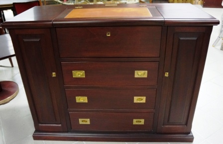 Combined chest of drawers and writing desk/dressing table in mahogany/brass fittings. From the Italian liner M/N G. Verdi. 