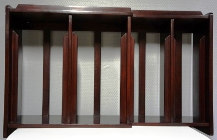 A pair of wall-mounted mahogany racks / stands for plates. 4 compartments/3 different sizes. From M/S Arolla, Nautilus shipping company.