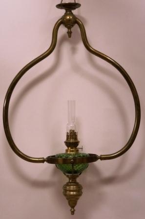 Late 19th century kerosene ceiling lamp mounted in gimbals. Made of brass. 