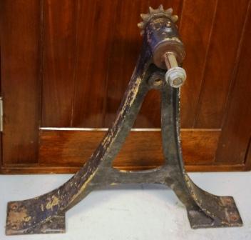 Early 20th century metal wheel stand