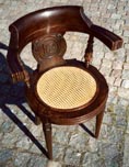 A pair of early 20th Century dining room chairs from the shipping company P&O (Peninsular & Oriental).