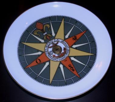 20th century numbered plate depicting a Swedish 18th century compass made at Karlskrona naval docks by F.H. 1783. Compass history on reverse.