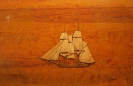 The sailing ship Integrity. 19th Century Silk and Wood Picture mounted on wooden panel. 
