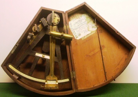 19th century octant in original mahagony case. Maker unknown. Adjusted by O.T.Olsen compass adjuster and nautical instrument maker in Grimsby, ebony frame, scales and maker`s plaque in ivory, one telescope and one sun-filter. 