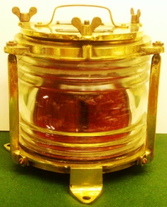 Electrified 20th century all round red signal light in brass. Made by William Harvie & Co. Ltd., Ships Lamp & Lighting Manufacturers, Bishop Street, Birmingham (not under command).