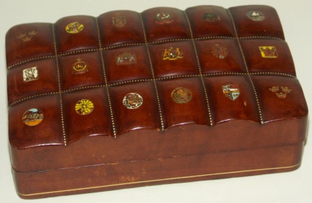 1930’s/1940’s leather box made specially for the Swedish American Line. Decorated with 18 different emblems incl the SAL logo.