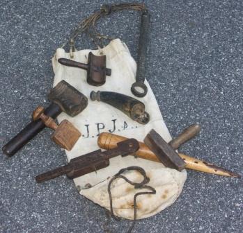 19th century sailmaker canvas bag with initials. Containing 7 hand tools. 