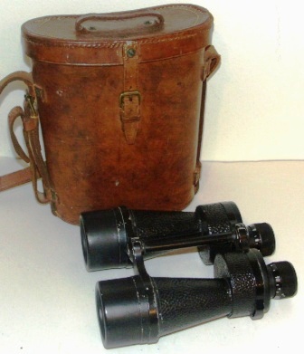 WWII "RL - Timbers" Binocular Prismatic No 5. MK I, x7. Made 1940 of black laquered metal, leather-bound. In original leather case.