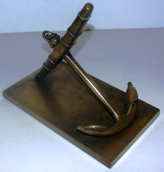 Early 20th century solid admirality anchor in bronze.