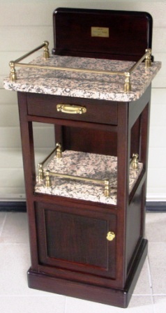 Bedside cabinet in darkstained oak from the British liner M/S Capetown Castle 1937. Drawer and compartment. Furnished with granite top and brass rails.