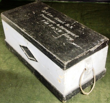 19th century canvas-covered wooden travellers trunk. Belonged to R. C. Lee. Gunr. R. N. (Royal Navy) Passenger to Devonport via L & SW Rlwy. Bottom covered with paper containing notes "The Commanding Officer H.M.S. Amphitrite Chatham" 