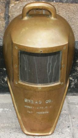 Early 20th century U.S. shallow water brass diving helmet. Made by Snead Co., Jersey – City N.J.