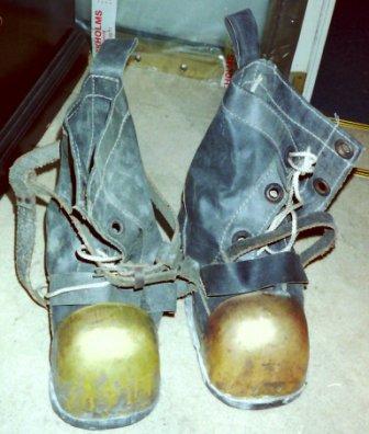 A pair of 20th century Russian diving shoes (Soviet Union). Lead soles, canvas and brass shod. 