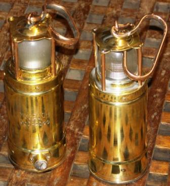 20th century battery powered portable lamps in brass with detachable copper handle