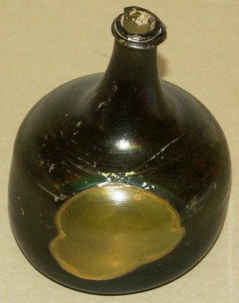 Early 19th century salvaged glass bottle