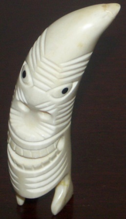 Early 20th century carved Greenland whale tooth from the village Narsak, "Erik den Rödes by" (Erik the Red's village).