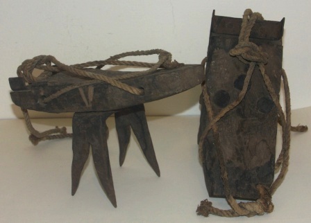 A pair of handmade late 19th century ice shoes from the Stockholm Archipelago. Marked with left (V = vänster) and right (H = höger). Wood, iron and rope.