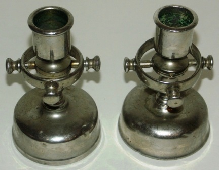 A pair of late 19th century crown-marked candlesticks from the Swedish Navy. Made of white metal, mounted in gimbals (excl wall brackets). 
