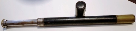 Early 20th century crown-marked (56) hand-held refracting telescope, made by H. Hughes & Son Ltd, London. Marked 416/3636. One draw, leatherbound tube.
