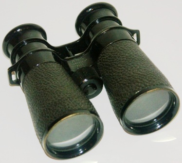 20th century Busch binocular "Camponett" 4x40. Made of black laquered brass, leather-bound.