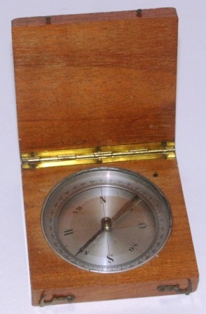 Early 20th century pocket compass mounted in wooden case. 