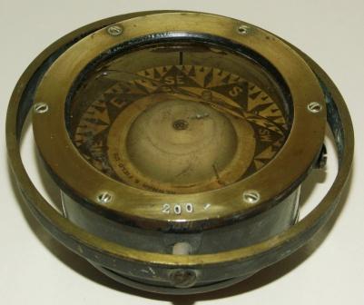 Early 20th century compass in brass, made by Newman & Field Ltd., Birmingham. No 200. Mounted in gimbal. 