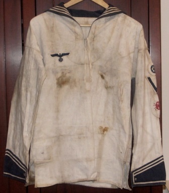 Salvaged WWII jacket from the German Navy "Kriegsmarine". Dated 1938, with the German Nazi symbol (Swastika & eagle). 