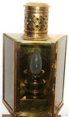Early 20th century electrified bulkhead lamp in brass.