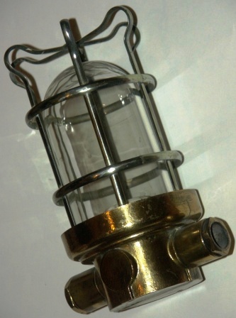 20th century electric engine room / bulkhead light made of solid brass.