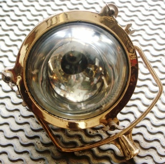 20th century electrified deck light in copper and brass. Complete with mounting bracket.