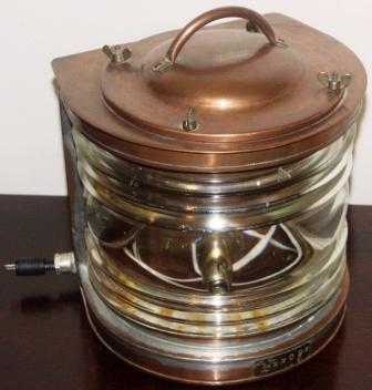 20th century electrified copper masthead light. Marked with three crowns/Km 22092. Made by Erik Ohlsson Helsingborg (Sweden). 