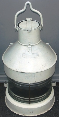 20th century white painted galvanized masthead light, complete with original kerosene burner. Marked Meteorite 034711.