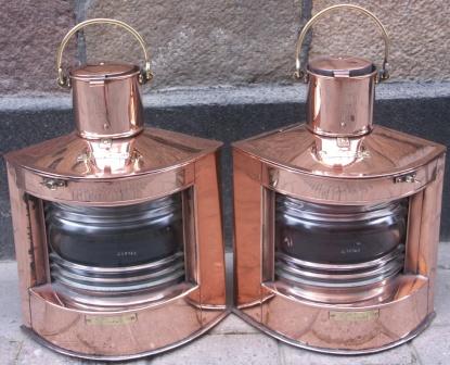 Pair of 20th century navigation lanterns made by C.M. Hammar, Göteborg and marked with three crowns, G35762 and G35763. The oil burning lamps are housed in copper cases, marked BABORD and STYRBORD.