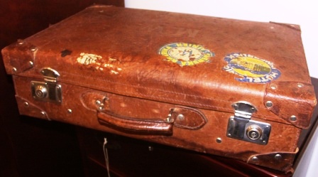 Leather suitcase, used onboard the liner T.S. DROTTNINGHOLM (SAL, SWEDISH AMERICAN LINE) in 1939. Belonged to Martin G. Winberg, Stockholm, cabin 341, travelling April 29, 1939