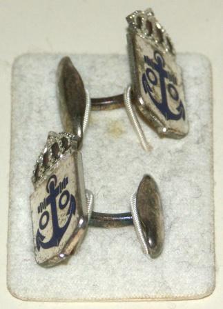20th century cuff-links from the Swedish Navy's HMS Älvsnabben, marked with crown and anchor symbols. Made by Sporrong Sweden. 