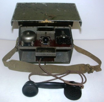 1940 portable telephone set D. MK. V with telegraph / morse key. Made by P.T & E.W. Ltd. Serial No 39862. Marked N-735 on the lid. 