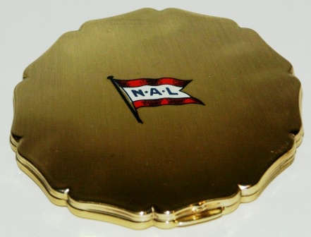 20th century metal face powder container from NAL, The Norwegian America Line