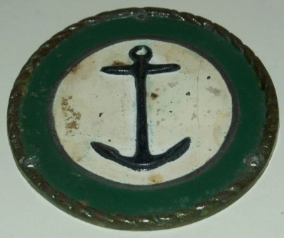 Early 20th century plate from the Swedish Navigation Society (Navis). Painted metal. 