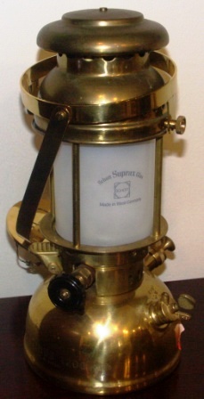 20th century combined table/ceiling/wall kerosene lamp made of brass. With frosted glass, made in Sweden by Optimus (glass made in West Germany). No 1200.
