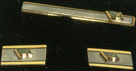 Mid 20th century cuff-links and tie holder from the Swedish shipping company Wallenius. 