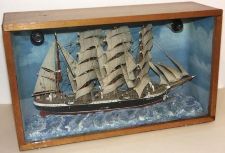 Early 20th century sailor-made illuminated diorama. Depicting the well-known four-masted barque PAMIR. Mounted in origianal case.