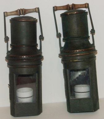 A pair of 20th century electrified binnacle lamps, made of brass.