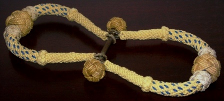 A pair of 20th century sailor-made sea-chest beckets. Dressed in laquered rope. 