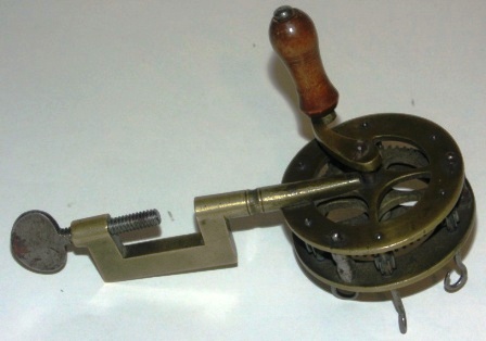 Early 20th century brass cordage tool.