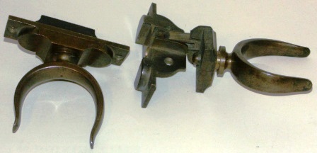 A pair of 20th century folding rowlocks made of brass. "Martin's Patent". 