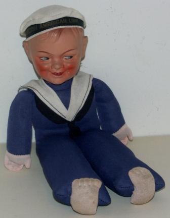 Swedish American Line (SAL) doll depicting an able seaman. Gypsum head, body made of fabric. 