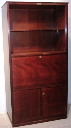 (Drinks) cabinet in mahogany from the Italian vessel M/C Egnazia. Sliding glass doors, fold-down flap & double door. 