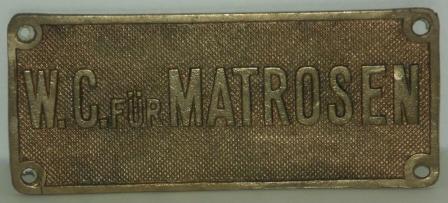 WWII brass plate, salvaged from a German Navy vessel. "W.C. für Matrosen".