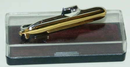 Mid 20th century tie holder depicting a Swedish submarine. In original box. 