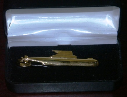 Mid 20th century tie holder depicting a Swedish submarine. In original box. 